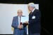 Dr. Nagib Callaos, General Chair, giving Dr. Bruce R. Barkstrom the best paper award certificate of the session "Information Systems, Technologies and Applications". The title of the awarded paper is "Using Formal Concept Analysis for Categorizing Earth Science Data and Object Collections."